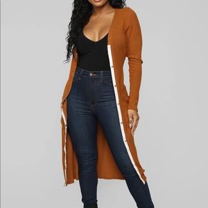 Long burnt orange/brown cardigan.